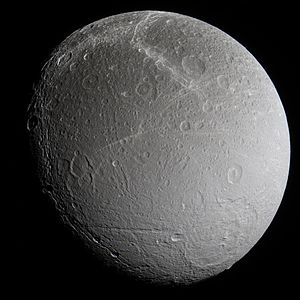 South polar features include huge, shallow impact basin Evander, the Palatine Chasmata by the terminator and Aufidus Catena between. The curving Padua Chasmata are at top.