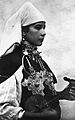 Image 48A Berber musician wearing two large triangular brooches in southern Morocco (early 20th century photo) (from Culture of Morocco)