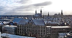 Panoramic view of Aachen, including Kaiser Karls Gymnasium (foreground), townhall (back center) and cathedral (back right)