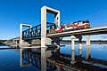 Image 55A Sr1-pulled lumber train crossing the drawbridge along the Savonia railway in Kuopio, Finland (from Rail transport)