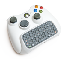 Xbox 360 Chatpad from the Messenger Kit attached to a wireless controller