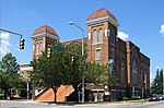 A church in brick at the street corner