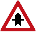 Dangerous intersection with priority indication (for the next intersection only). Different variants of the sign can be used on both priority- and non-priority roads. Each sign has the thicker line indicating the road or direction that has priority with the viewer's own direction being from the bottom of the sign.