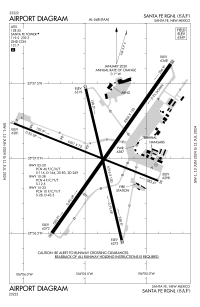 A map with a grid overlay showing the terminals runways and other structures of the airport.