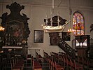 Vue de l'intérieur de l'église des Capucins d'Ostende avec une maquette de corvette du XVIIIe siècle.