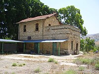 Former railway station of Al-Hamma, with a sign in Arabic reading "al-Hama".[1]