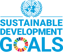 Logo for the United Nations Sustainable Development Goals with the UN symbol above the words «Sustainable Development Goals». The «O» in goals being a rainbow of colours