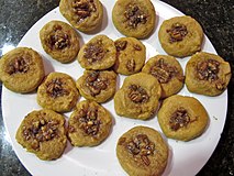 Lemon pecan sandies with the nuts atop