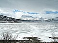 Strandavatnet is an artificial lake, used by ECO-energy Oslo for hydropower. The mountains on the other side belong to national park Hallingskarvet.