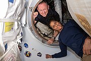 Williams and Wilmore in the vestibule that connects the ISS to Starliner