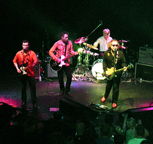 The Minus 5 performing in 2006. From left to right: John Ramberg, Peter Buck, Bill Rieflin and Scott McCaughey.