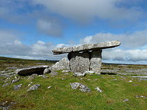 Poulnabrone dolmen, a Neolithic portal tomb about 1 kilometre (0.62 mi) north of Caherconnell ringfort.[7]