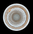 Image 12 Polar map of Jupiter Photo credit: Cassini orbiter This polar map of Jupiter, taken by the Cassini orbiter as it neared Jupiter during a flyby on its way to Saturn, is the most detailed global color map of the planet ever produced. The south pole is in the center of the map and the equator is at the edge. The map shows a variety of colorful cloud features, including parallel reddish-brown and white bands, the Great Red Spot, multi-lobed chaotic regions, white ovals, and many small vortexes. Many clouds appear in streaks and waves due to continual stretching and folding by Jupiter's winds and turbulence. More selected pictures