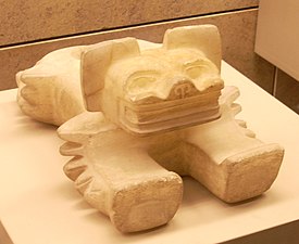 Alabasterstatue af en ozelot fra Teotihuacan, 5.–6. årh., muligvis en rituel beholder til ofrede menneskehjerter (British Museum)[25]