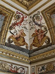 Baroque putti painted on the boiserie of a room from the Hôtel Colbert de Villacerf, now in the Musée Carnavalet, Paris, unknown architect, sculptor and painter, c. 1650[11]