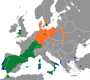 Distribuado de la Ruĝa milvo verde: la tutan jaron; oranĝe: reproduktantoj kiuj vintras for; blue: vintrejoj