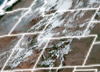 Satellite image of the western US, showing heavy smoke (gray) over oregon, idaho, and montana.