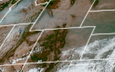 Visible satellite image of Idaho, Utah, Wyoming, and Colorado. Heavy smoke is visible in Idaho, Wyoming, and Utah, while light smoke is visible in Colorado.