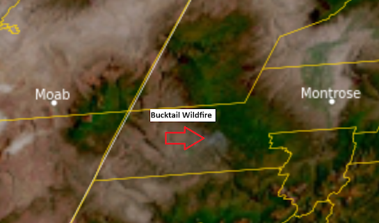 A satellite image showing smoke in the vicinity of the Bucktail wildfire in western Montrose County