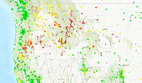 A map of the northwestern U.S. showing high particle pollution levels in Oregon, Idaho and Montana