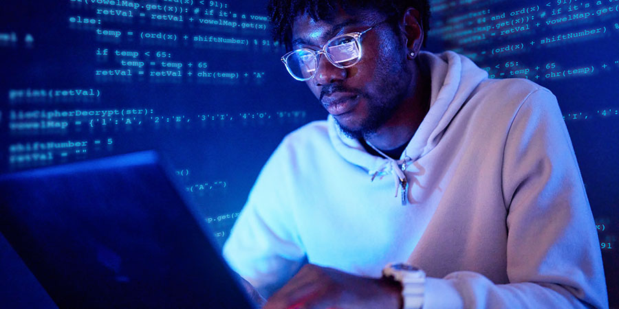 young man working on laptop