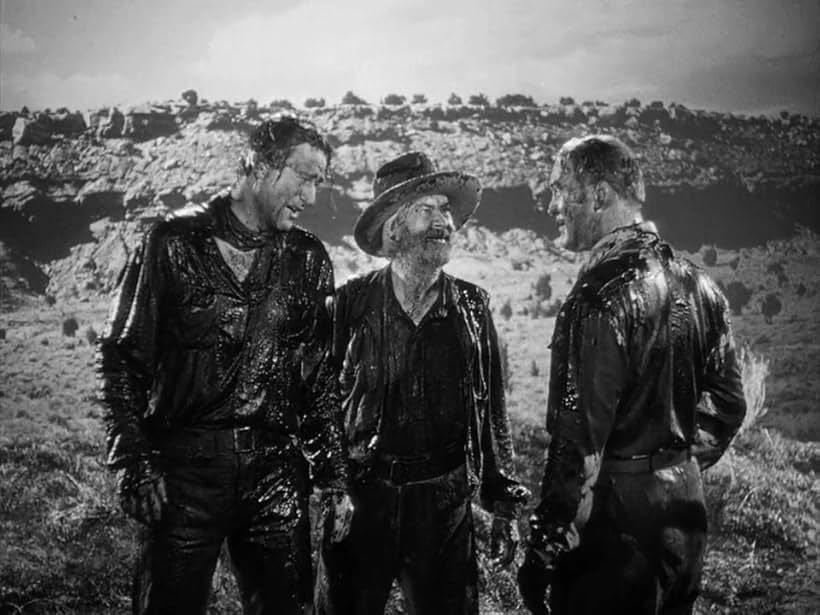 John Wayne, Albert Dekker, and George 'Gabby' Hayes in In Old Oklahoma (1943)