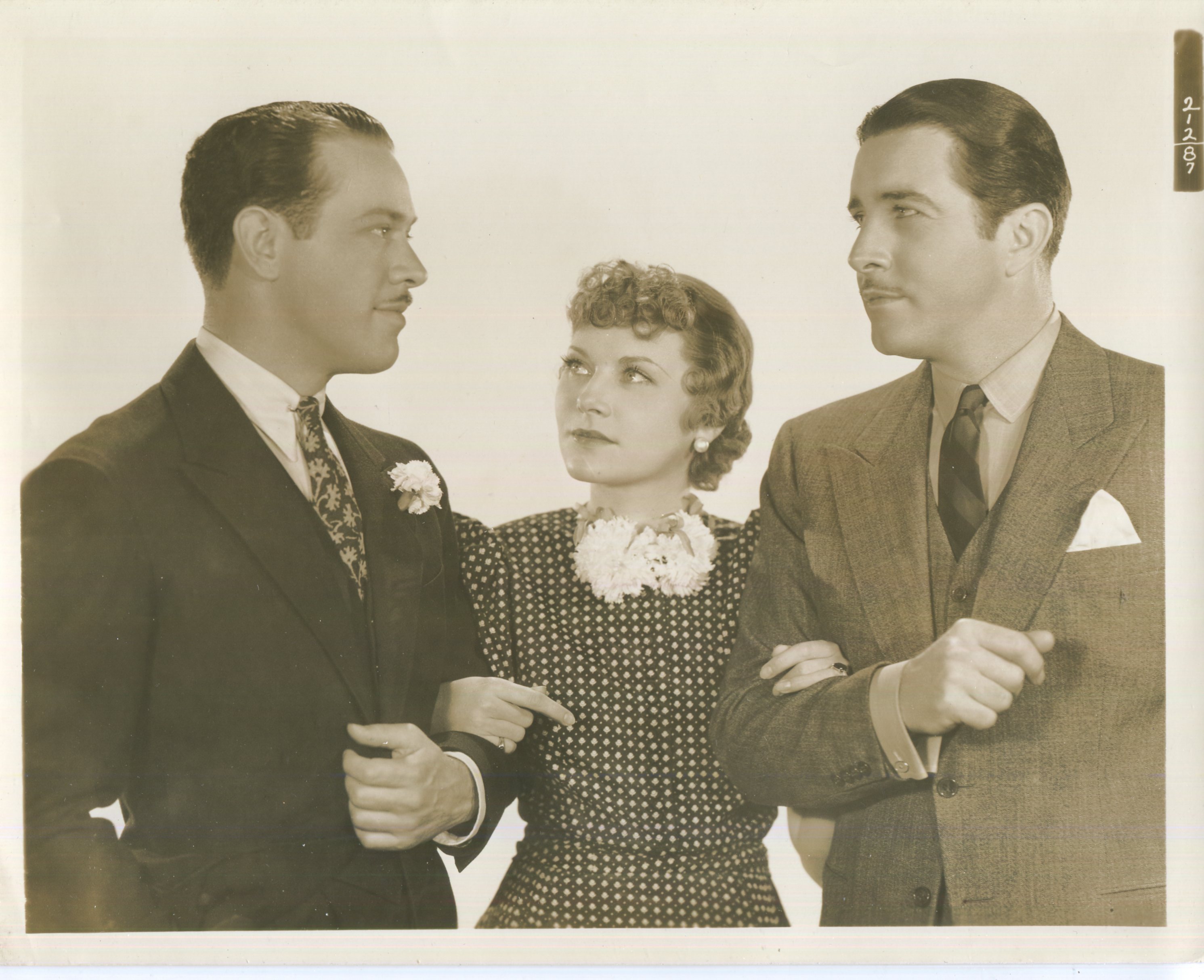 John Boles, Harvey Stephens, and Ruthelma Stevens in Orchids to You (1935)