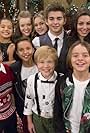 Riele Downs, Megan Lee, Jade Pettyjohn, Diego Velazquez, Haley Tju, Buddy Keaton, Breanna Yde, Sean Ryan Fox, Kira Kosarin, Jaheem Toombs, Jack Griffo, Madisyn Shipman, Casey Simpson, Mace Coronel, Isabela Merced, Brec Bassinger, Jace Norman, Aidan Gallagher, Lizzy Greene, Thomas Kuc, Owen Patrick Joyner, Erika Tham, and Maya Le Clark in Nickelodeon's Ho Ho Holiday Special (2015)