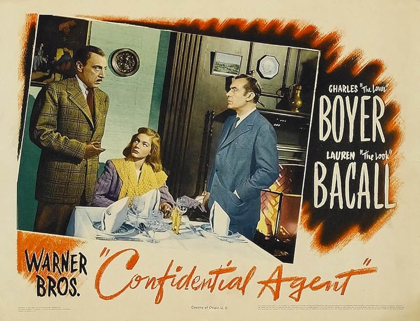 Lauren Bacall, Charles Boyer, and George Coulouris in Confidential Agent (1945)