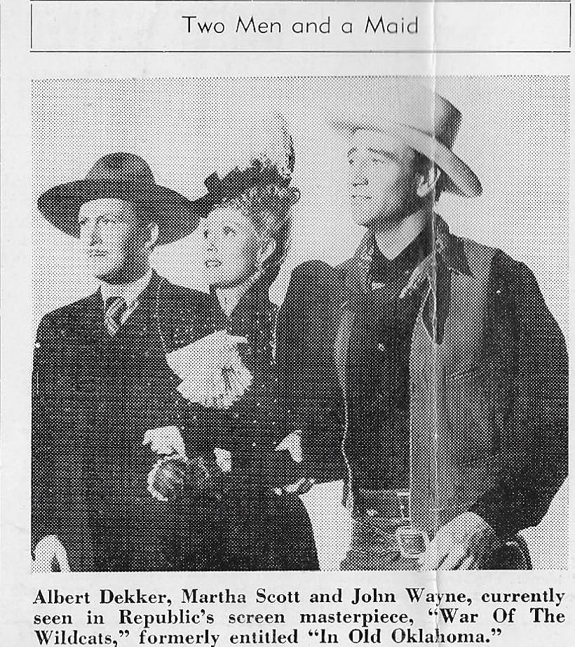 John Wayne, Albert Dekker, and Martha Scott in In Old Oklahoma (1943)