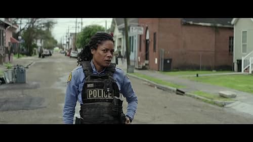 A rookie Detroit cop stumbles upon corrupt officers murdering a drug dealer, an incident captured by her body cam. They pursue her through the night in an attempt to destroy the footage, and to make matters worse, they've tipped off a criminal gang that she's responsible for the dealer's death.