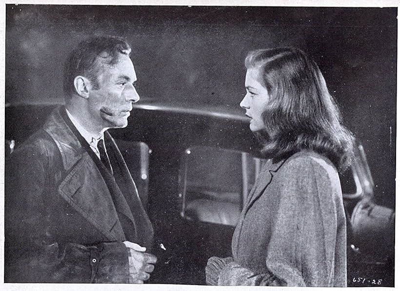 Lauren Bacall and Charles Boyer in Confidential Agent (1945)