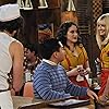 Kat Dennings, Jonathan Kite, Matthew Moy, and Beth Behrs in 2 Broke Girls (2011)