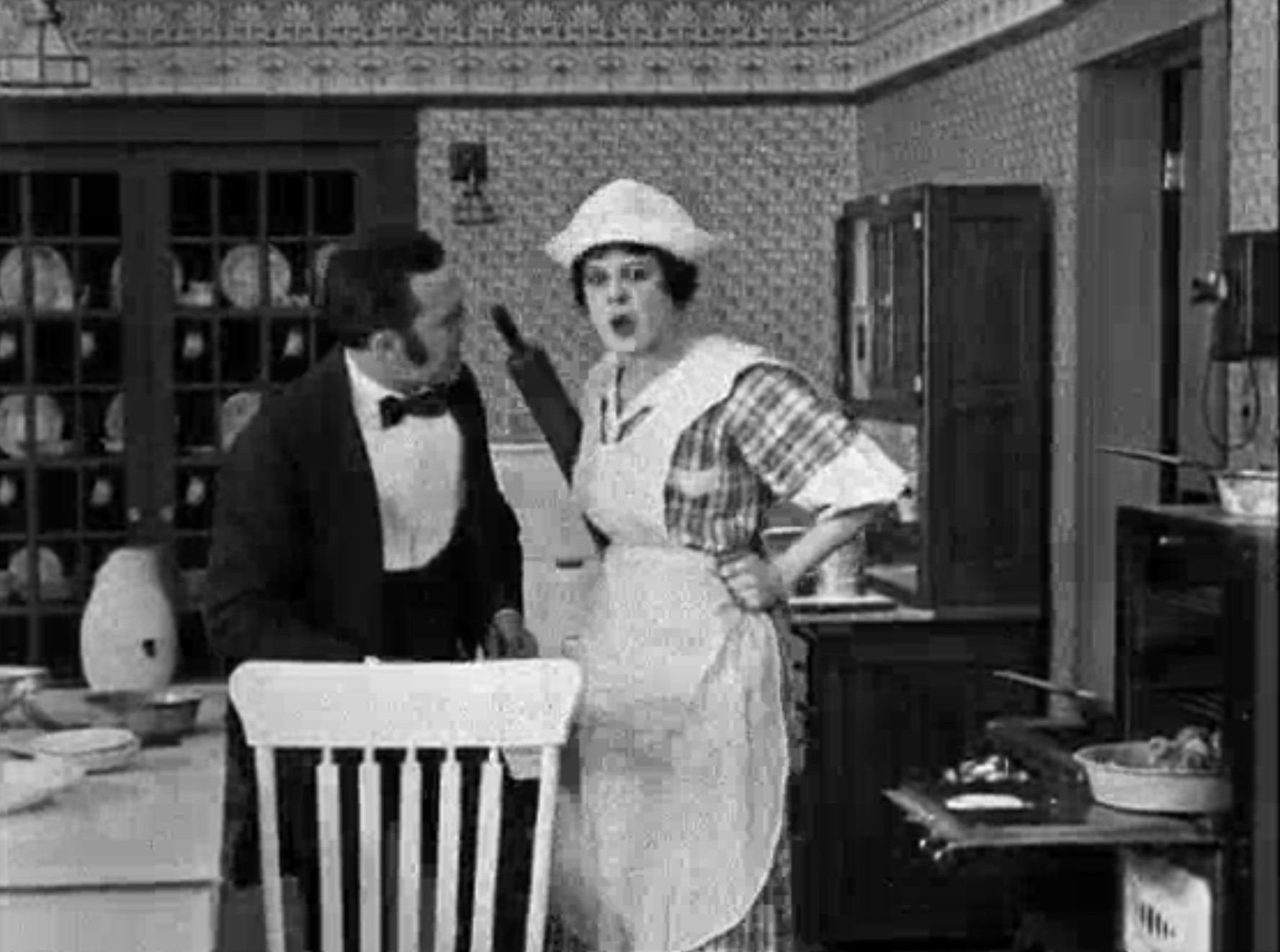 Dot Farley and Otto Fries in The Paperhangers' Revenge (1918)