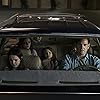 Henry Thomas, Mckenna Grace, Lulu Wilson, Julian Hilliard, Paxton Singleton, and Violet McGraw in The Haunting of Hill House (2018)