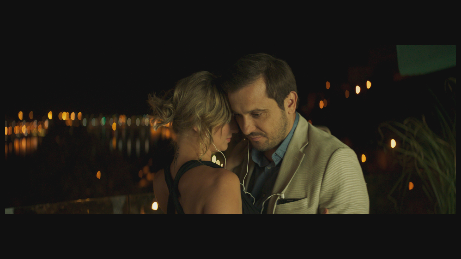 Béla Mészáros and Réka Tenki in Neither with You (2019)