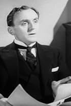 Henry Oscar in Dark Journey (1937)