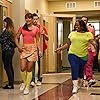 Lea Michele, Mark Salling, Amber Riley, and Chord Overstreet in Glee (2009)