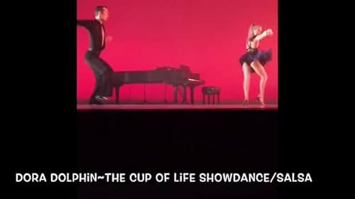 DORA DOLPHIN 10 Time National Dance Champion, 7 Time Regional Dance Champion, 6 Time Latin Junior Open Scholarship Champion, 2 Time Latin Solo Champion, BEST IN SHOW in Twin Cities Ballroom Competition. Dance For A Cure Ballroom Champion.