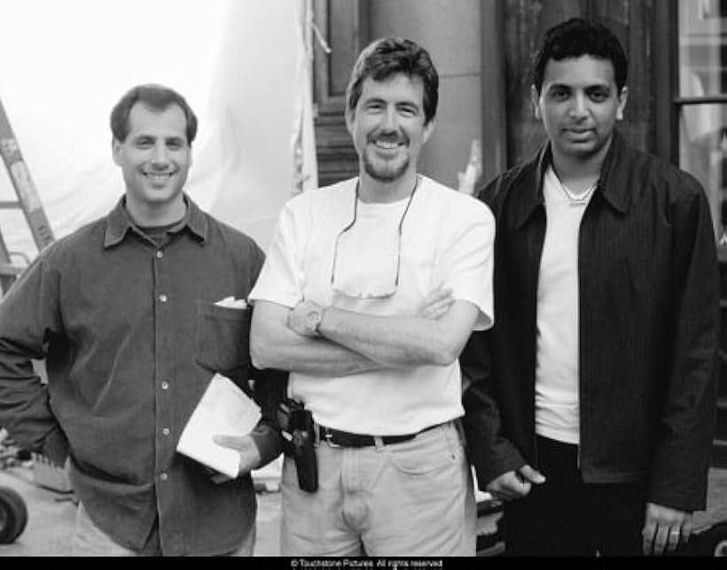 Producers Barry Mendel and Sam Mercer with director M. Night Shyamalan - Photo Credit: Frank Masi. S.M.P.S.P.