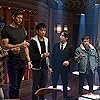 Elliot Page, Robert Sheehan, Tom Hopper, David Castañeda, Justin H. Min, Ritu Arya, Aidan Gallagher, and Emmy Raver-Lampman in The Umbrella Academy (2019)