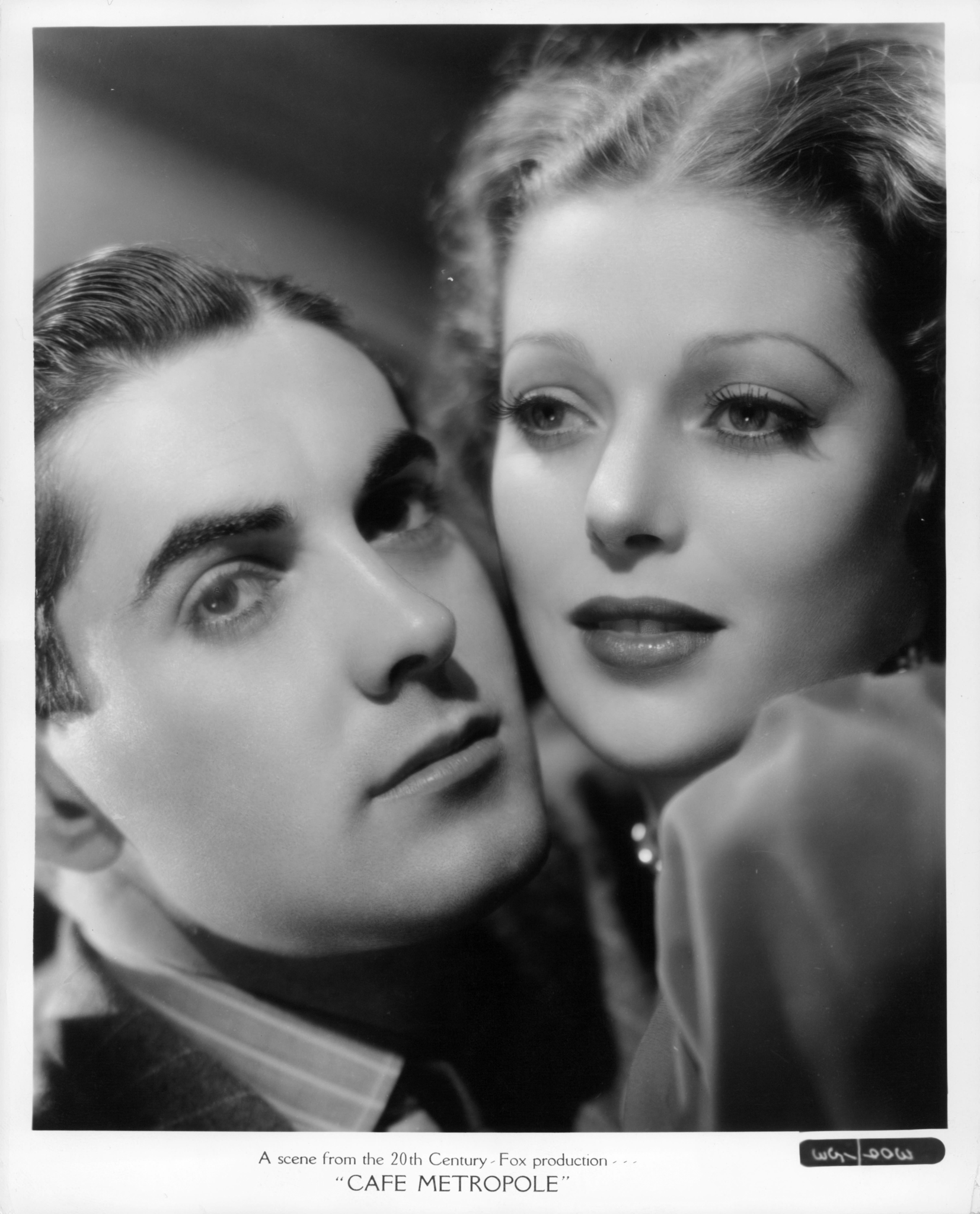 Tyrone Power and Loretta Young in Café Metropole (1937)