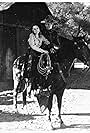 Phyllis Bainbridge and Bob Custer in O'Malley Rides Alone (1930)