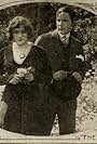 Rupert Julian and Elsie Jane Wilson in The Hole in the Garden Wall (1914)