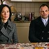 Jonny Lee Miller and Lucy Liu in Elementary (2012)