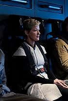 Gretchen Mol, Angus Sampson, and Eoin Macken in Nightflyers (2018)