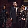 Paul Blackthorne, Katie Cassidy, and Juliana Harkavy in Arrow (2012)