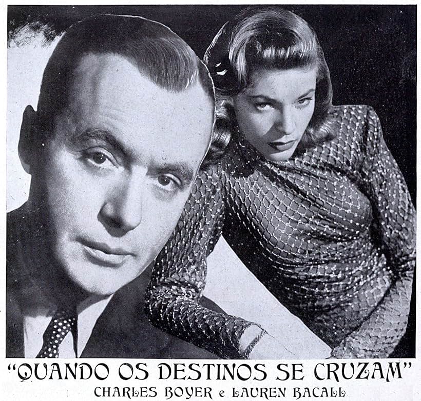 Lauren Bacall and Charles Boyer in Confidential Agent (1945)