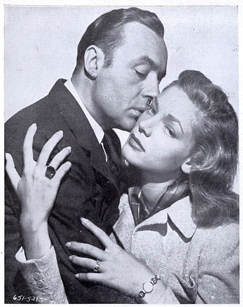 Lauren Bacall and Charles Boyer in Confidential Agent (1945)