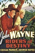 John Wayne and Cecilia Parker in Riders of Destiny (1933)